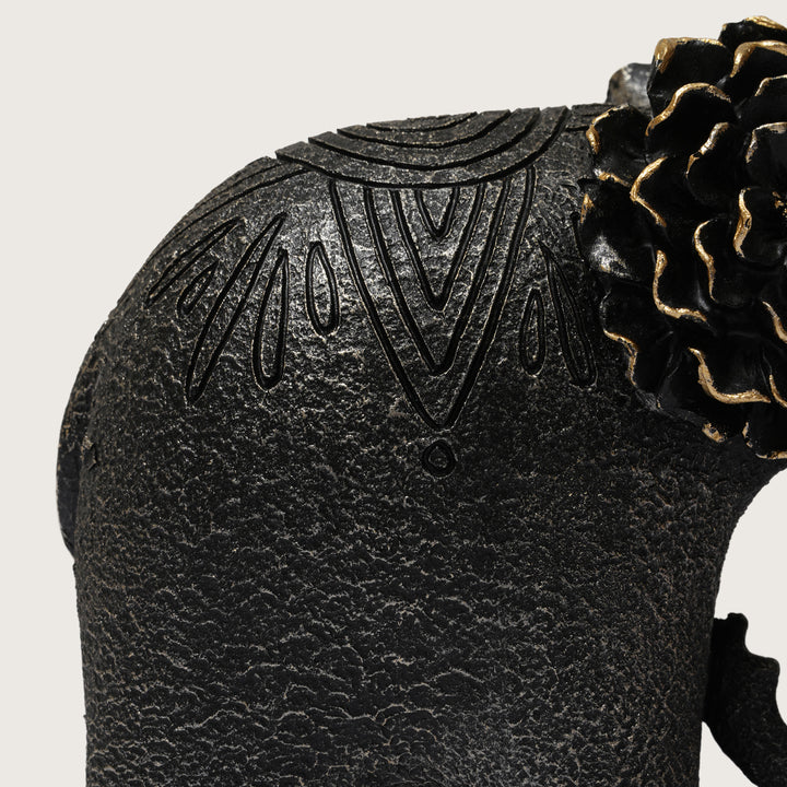 Textured Elephant Sculpture with Flower Headpiece
